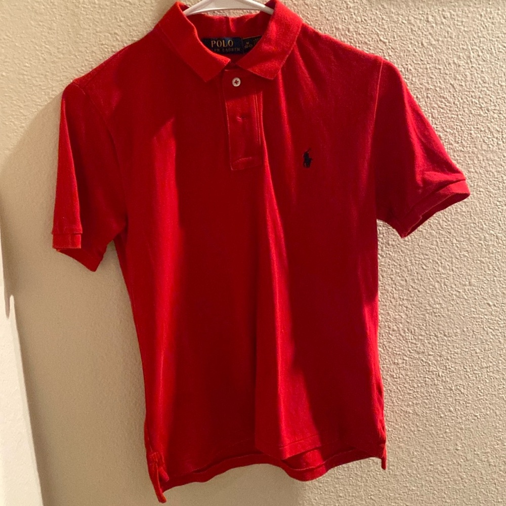 Red polo shirt. Size medium 10-12
